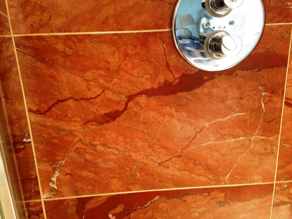 Damaged Marble Shower Tiles in Ringmer after